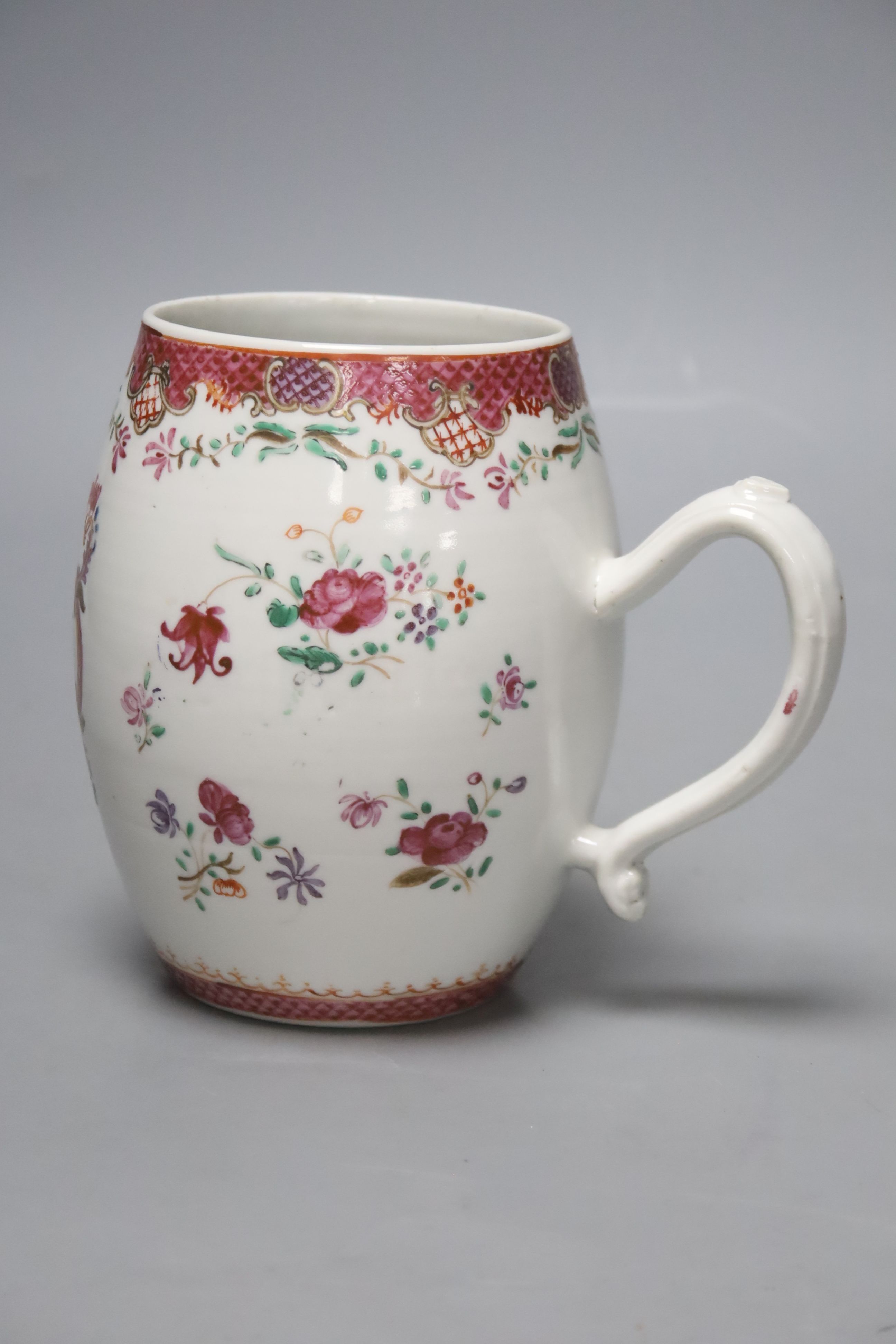 A large 18th century Chinese famille rose tankard, height 14.5cm